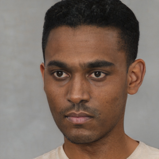 Neutral black young-adult male with short  black hair and brown eyes