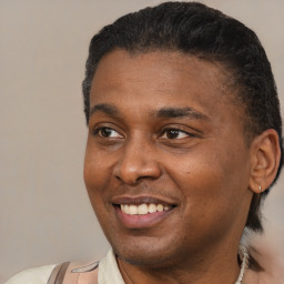 Joyful black young-adult male with short  black hair and brown eyes