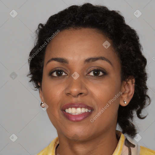 Joyful black young-adult female with medium  brown hair and brown eyes