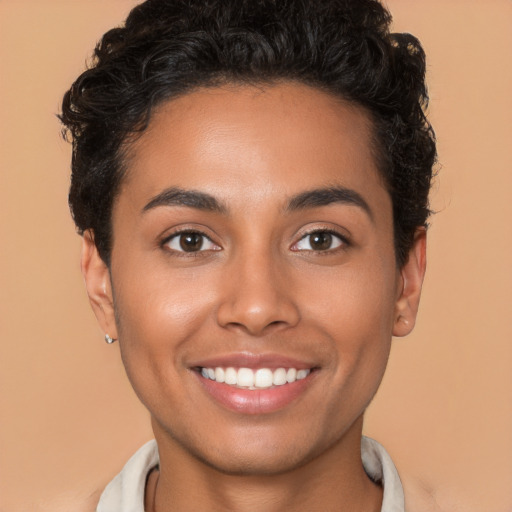 Joyful latino young-adult female with short  brown hair and brown eyes