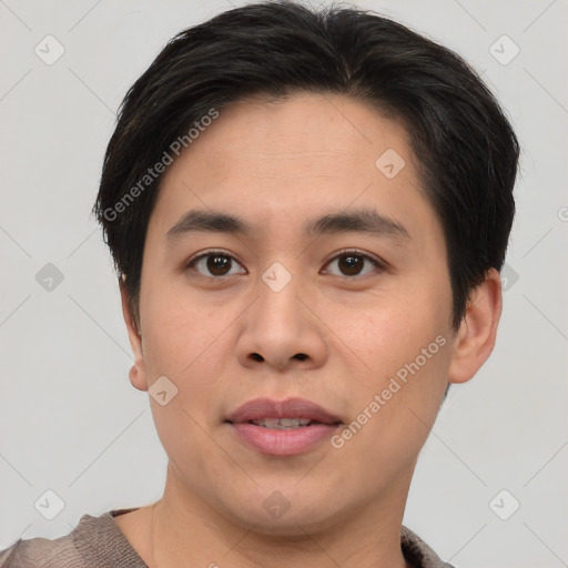 Joyful asian young-adult male with short  brown hair and brown eyes