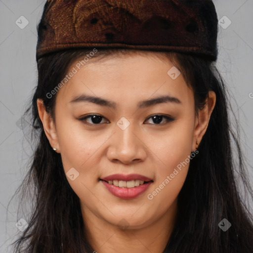 Joyful latino young-adult female with long  brown hair and brown eyes