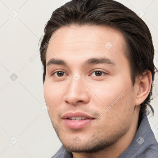 Neutral white young-adult male with short  brown hair and brown eyes