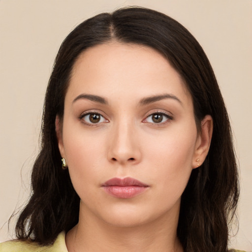 Neutral white young-adult female with long  brown hair and brown eyes