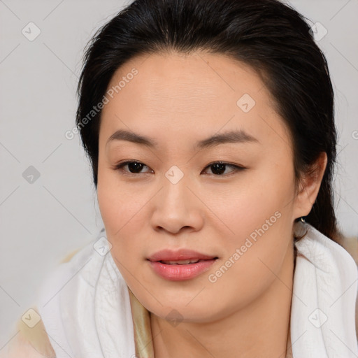 Joyful asian young-adult female with medium  brown hair and brown eyes