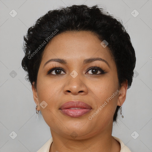 Joyful latino adult female with short  brown hair and brown eyes