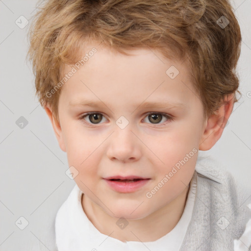 Joyful white child male with short  brown hair and brown eyes