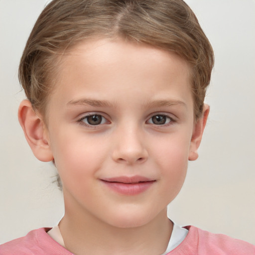 Joyful white child female with short  brown hair and brown eyes