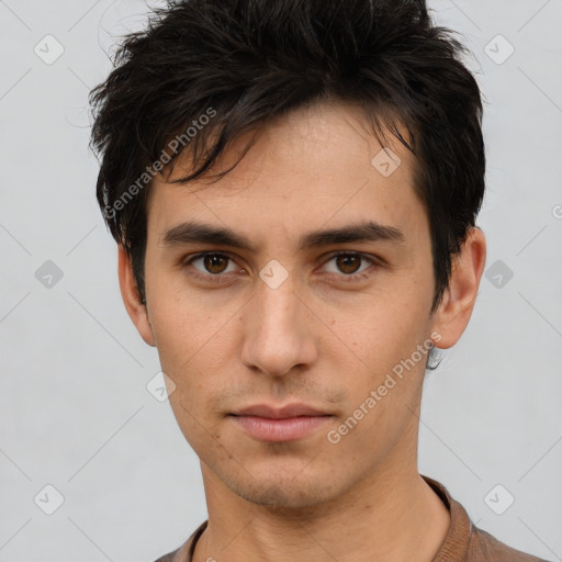 Neutral white young-adult male with short  brown hair and brown eyes