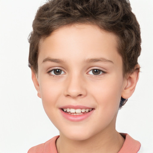 Joyful white child female with short  brown hair and brown eyes