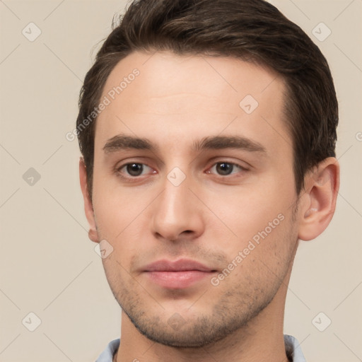 Neutral white young-adult male with short  brown hair and brown eyes