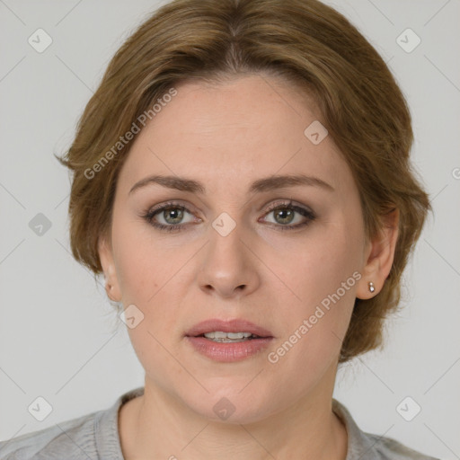 Joyful white young-adult female with medium  brown hair and green eyes