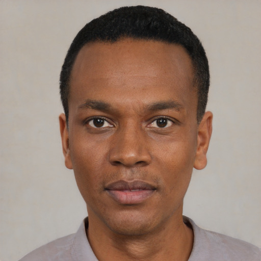 Neutral black young-adult male with short  black hair and brown eyes