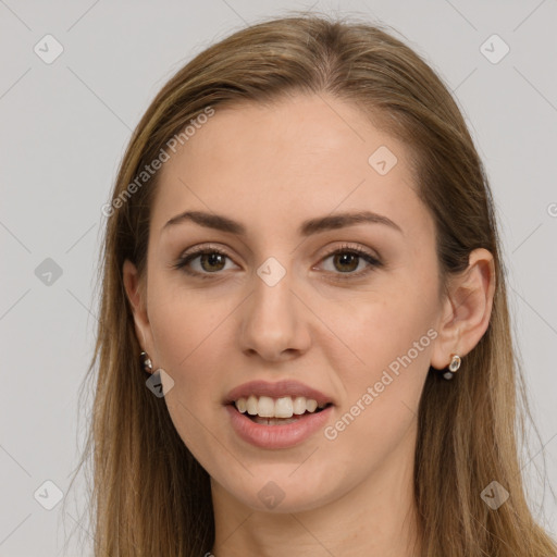 Joyful white young-adult female with long  brown hair and grey eyes