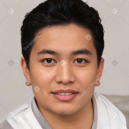 Joyful asian young-adult male with short  black hair and brown eyes