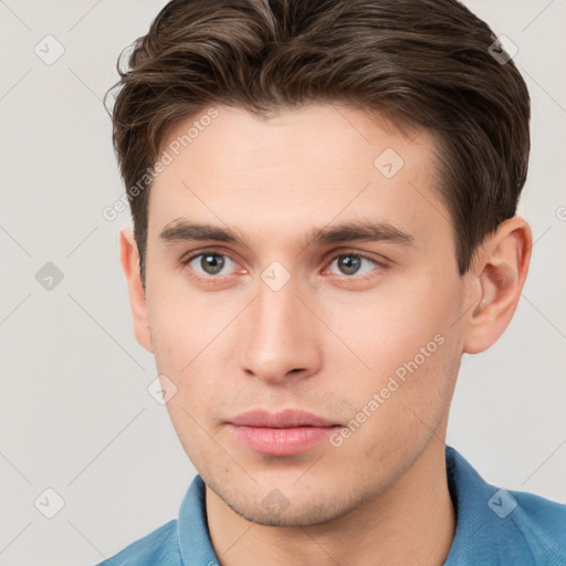 Neutral white young-adult male with short  brown hair and brown eyes