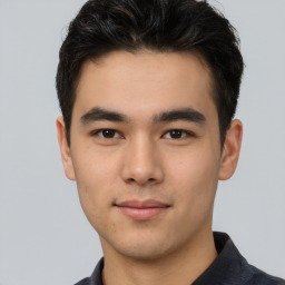 Neutral asian young-adult male with short  brown hair and brown eyes