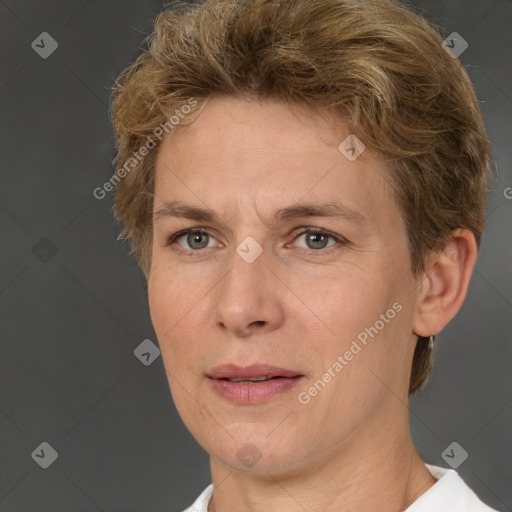 Joyful white adult female with short  brown hair and brown eyes