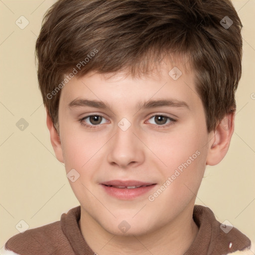 Joyful white child male with short  brown hair and brown eyes