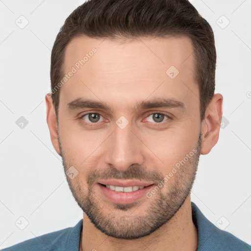 Joyful white young-adult male with short  brown hair and brown eyes