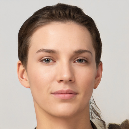 Neutral white young-adult female with short  brown hair and brown eyes