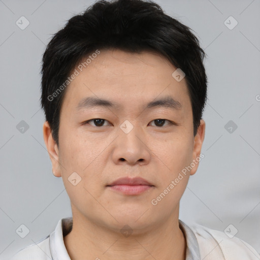 Neutral asian young-adult male with short  black hair and brown eyes