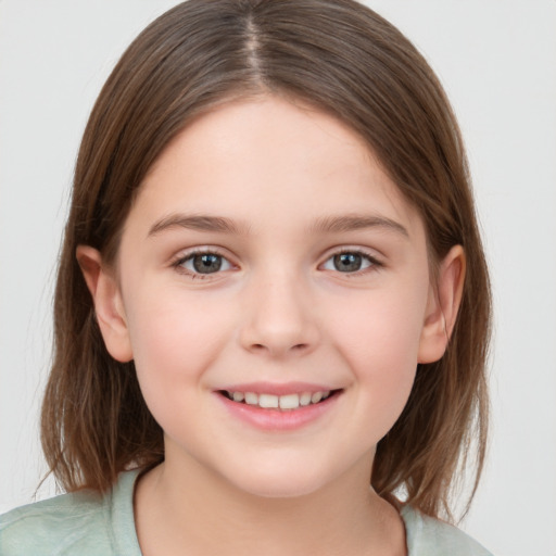 Joyful white child female with medium  brown hair and brown eyes