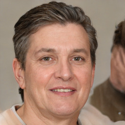 Joyful white middle-aged male with short  brown hair and brown eyes