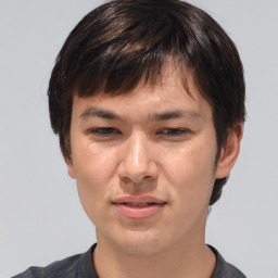 Joyful white adult male with medium  brown hair and brown eyes