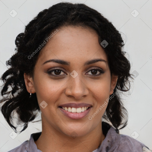 Joyful black young-adult female with long  brown hair and brown eyes