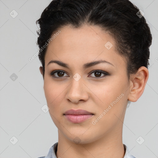 Joyful latino young-adult female with short  brown hair and brown eyes