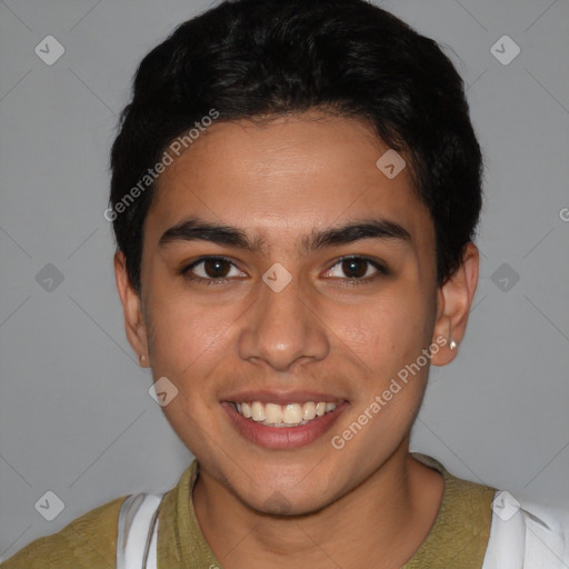 Joyful latino young-adult male with short  brown hair and brown eyes