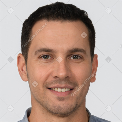 Joyful white young-adult male with short  brown hair and brown eyes