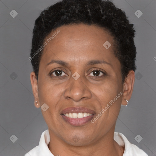 Joyful black adult female with short  brown hair and brown eyes