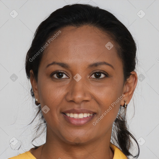 Joyful latino young-adult female with medium  brown hair and brown eyes