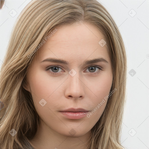 Neutral white young-adult female with long  brown hair and brown eyes