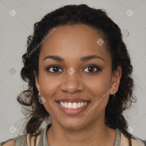 Joyful black young-adult female with medium  black hair and brown eyes