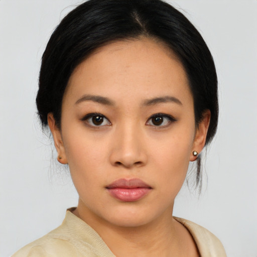 Neutral asian young-adult female with medium  black hair and brown eyes