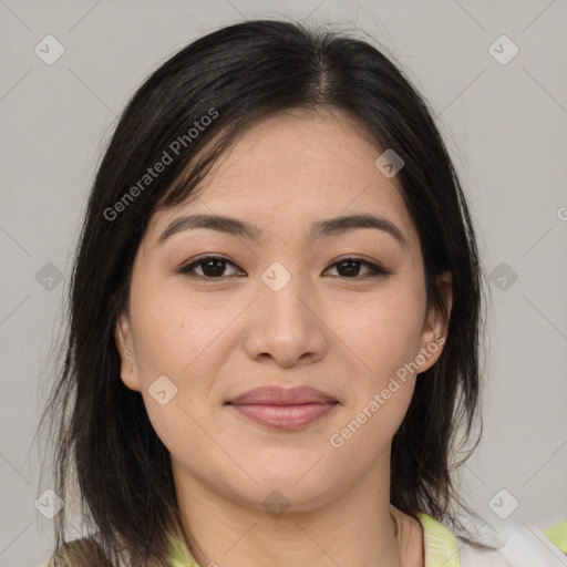 Joyful latino young-adult female with medium  brown hair and brown eyes