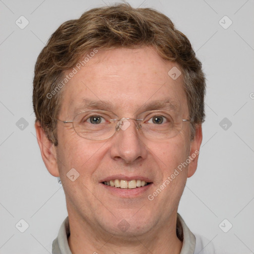 Joyful white adult male with short  brown hair and grey eyes