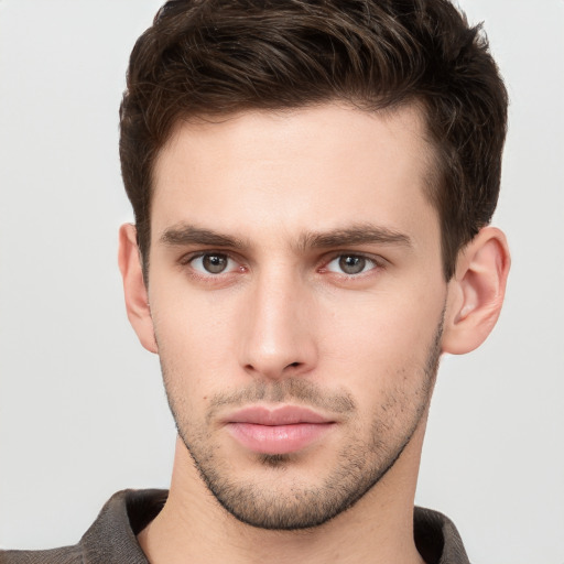 Neutral white young-adult male with short  brown hair and brown eyes