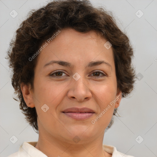 Joyful white adult female with short  brown hair and brown eyes