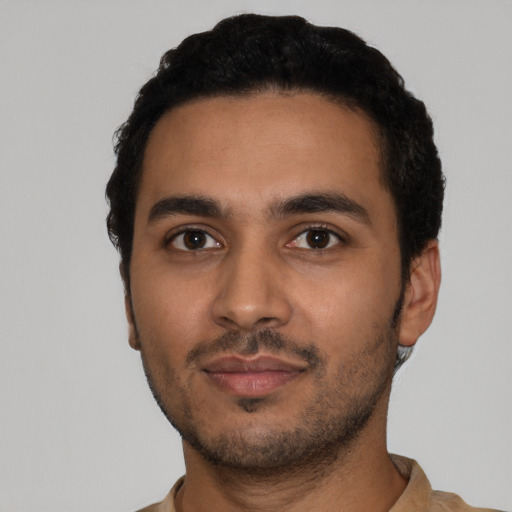 Neutral latino young-adult male with short  black hair and brown eyes
