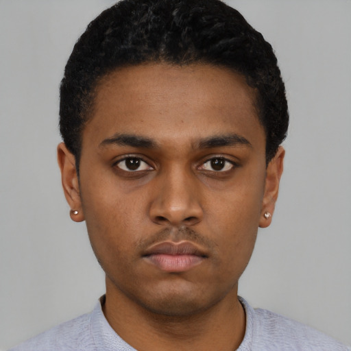 Neutral black young-adult male with short  black hair and brown eyes