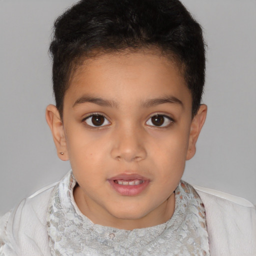 Joyful white child female with short  brown hair and brown eyes