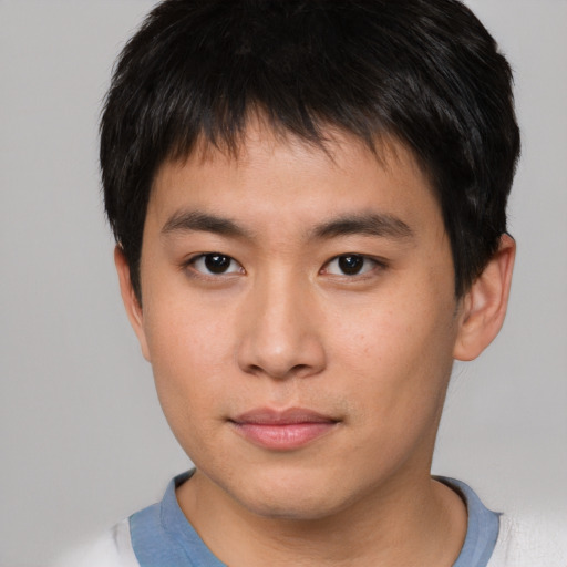 Neutral asian young-adult male with short  brown hair and brown eyes