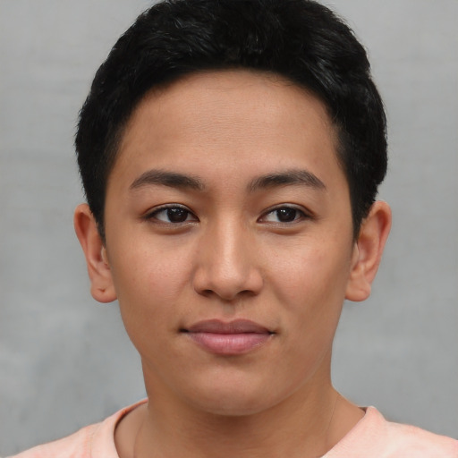 Joyful asian young-adult female with short  black hair and brown eyes