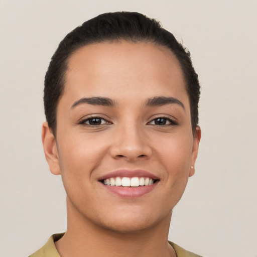 Joyful white young-adult female with short  brown hair and brown eyes