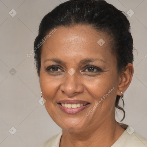 Joyful black adult female with short  brown hair and brown eyes