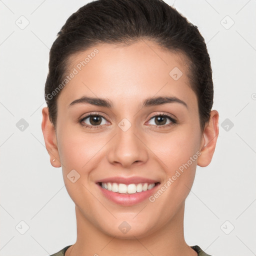 Joyful white young-adult female with short  brown hair and brown eyes